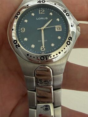 The Lorus Quartz Silver Tone Bracelet Watch with a Blue Dial